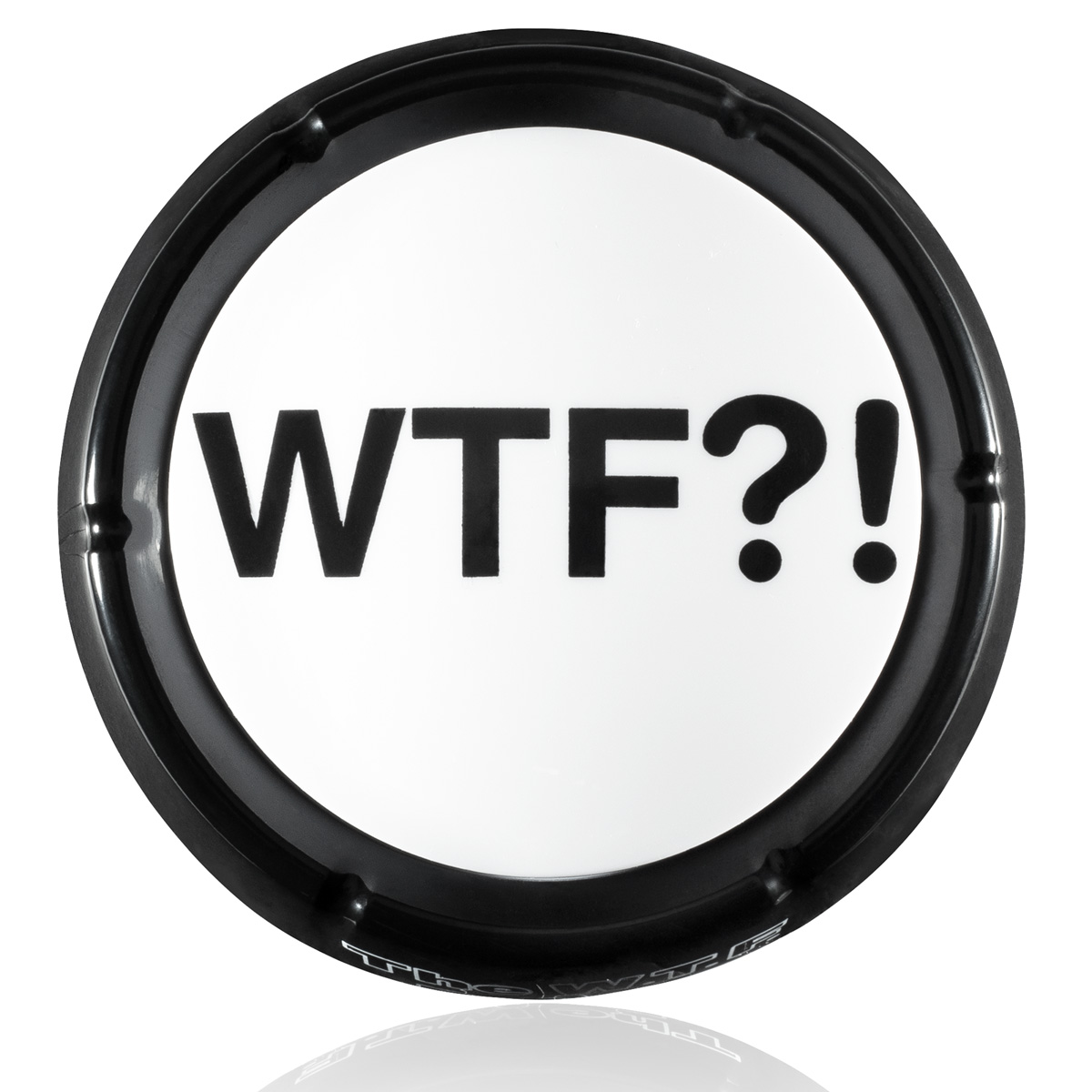 Top view of black and white WTF Button with large bold WTF?! text and black rim