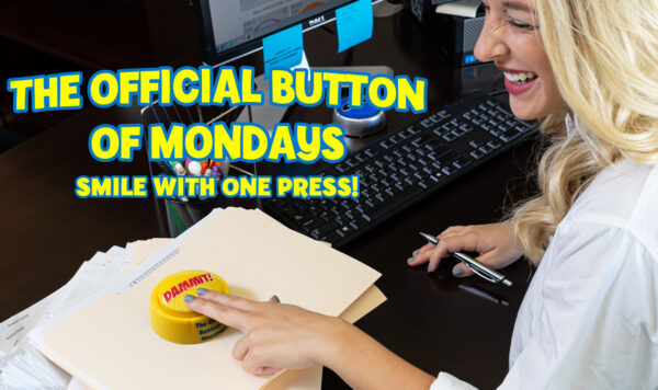 Woman pressing Dammit Button at work and laughing